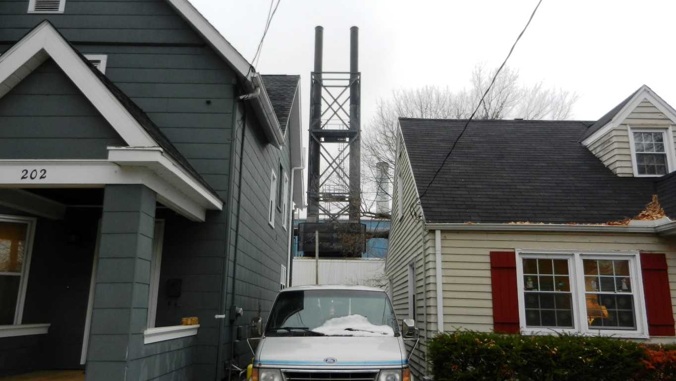 Madison-Kipp Aluminum
            Furnace Stacks Behind Homes